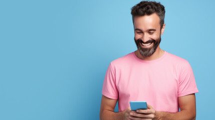 man smiling and holding her smartphone on a blue background