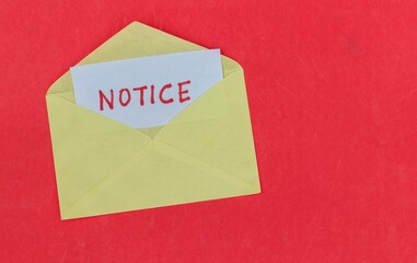 Notice Word in Envelope Isolated on Red Background with Copy Space