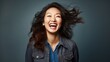 Young smiling charming asian woman, happy joyful cheerful cute Korean girl student laughing having fun, looking at camera, standing isolated at white background, close up headshot portrait.