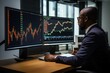© NikoG - Financial Analyst Monitoring Data on Computer Screens