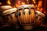 Conga drums arranged on a stage under dramatic lighting ready for a concert. Traditional percussion musical instrument of Afro-Cuban. Bright performance