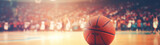 Fototapeta Sport - basketball ball in a stadium close up - copyspace