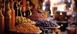 Fototapeta  - Marrakesh, Morocco's souk has a stall for olives and bottled food.