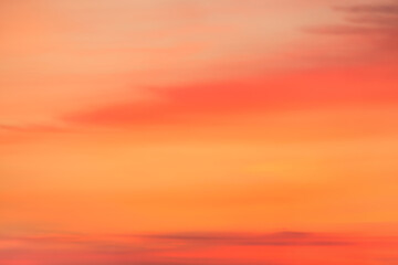 Wall Mural - A beautiful sky tinted by the sun leaving vibrant shades of gold, pink, blue and multicolored. Clouds in the twilight evening and morning sky. Image of a cloudy sky in the evening and during the day