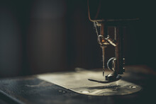 Vintage Sewing Machine, Man Sews On A Vintage Sewing Machine, Retro Sewing Machine