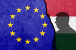 Europe Union and Hungary flags painted on the concrete wall