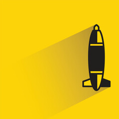 Wall Mural - missile icon with shadow on yellow background