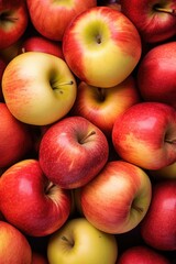 Poster - A pile of red and yellow apples stacked on top of each other. Perfect for showcasing the abundance of fresh fruits.