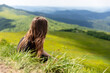 Head of a young woman against the background of mountains, Biszczady, Poland