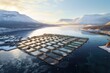 A bird's-eye view of a fish farm situated in the middle of a serene lake. This image can be used to depict aquaculture, sustainable fishing practices, or the beauty of nature