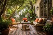A Mediterranean-inspired outdoor terrace with terra cotta tiles, wrought iron furniture, and lush greenery, offering a charming and relaxing retreat.