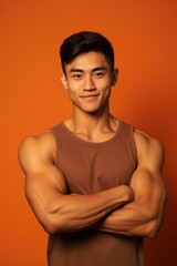 Poster - A man in a tank top posing for a picture. Suitable for fashion or fitness-related projects