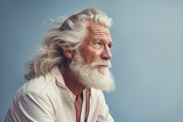 Poster - A picture of a man with a long white beard wearing a white shirt. This image can be used for various purposes