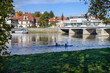 View of Vah riverbank with Spa Bridge and kayakers (Piestany, Slovakia)