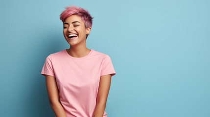 Sticker - Happy girl wearing a pink t-shirt, smiling against a blue background