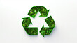 Green recycling logo made from pieces of plastic on a white background.