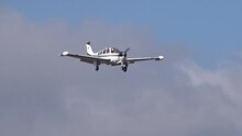 Small Regional Pleasure Turboprop Propeller Plane Aircraft Airplane Landing Final Approach Into Airport Airfield