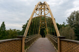Fototapeta  - Footbridge connecting parts of the historic dike (Bierunska grobla). Bierun, Poland.