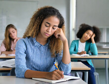 Female Student Bored Sleepy Caucasian Woman Tired Sad Stressed Girl In Class Teen Pupil Teenager Lady In University High School College Classroom During Lesson Boredom Lecture Education Study Learning