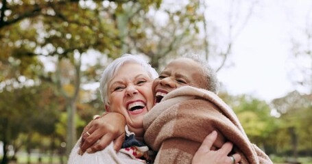 Wall Mural - Nature, happy and senior friends hugging while walking in outdoor park for fresh air and exercise. Happiness, smile and elderly female people bonding, having fun and exploring green garden together.