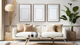 Fototapeta  - Three empty vertical picture frames in a modern living room with white sofa and beige pillows. Japandi interior. Wall art mockup.