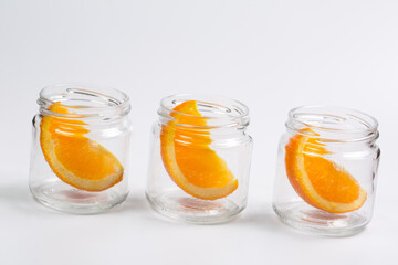 Slices of orange sweet orange on a white background, citrus fruit on a white background