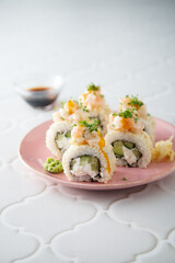 Wall Mural - Shrimp sushi rolls with mango sauce