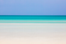 Horizontal Blurred Beach View With Turquoise Sea