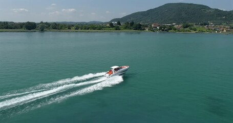 Wall Mural - aerial view of motor yacht on the lake of iseo, italy