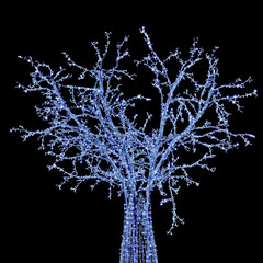 Sticker - blue illuminated tree in garlands isolated on black