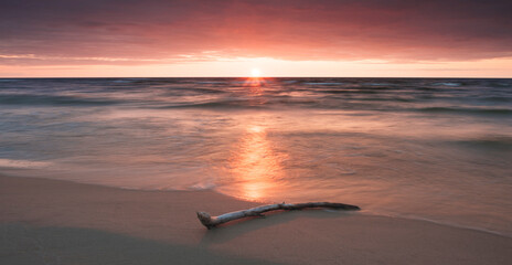 Wall Mural - colourful sunset on the sea beach with sky  for background, vacation travel concept