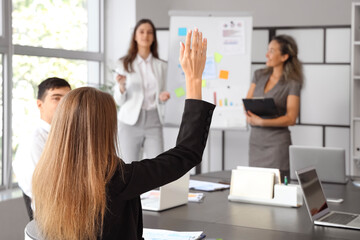 Wall Mural - Group of business people having meeting in office, back view