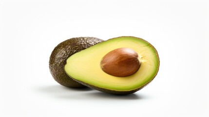 Poster - Avocado cut in half on a white surface. Suitable for food and nutrition-related content
