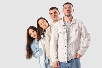 Sticker - Group of young people in stylish denim jackets on white background