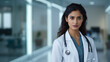 © Rusiru Dilshan  - Portrait of female doctor standing in hospital corridor. Woman doctor.