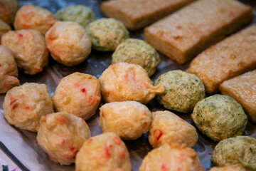 Wall Mural - Fried tofu snacks at a Japanese street food market in Tokyo.