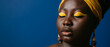 © gstockstudio - Close-up of gorgeous African woman with beautiful make-up and jewelry on blue background