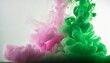 Green pink color smoke. Acrylic colors in water. Abstract white background 