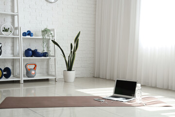 Canvas Print - Interior of gym with shelving unit and sports equipment