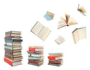 Wall Mural - Books flying over stacks on white background