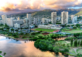 Wall Mural - Colorful Pink Clouds Buildings Waikiki Ala Wai Canal Honolulu Hawaii