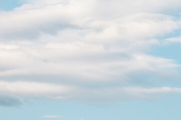 Wall Mural - background of blue sky with white clouds