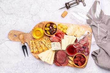 Wall Mural - Antipasto board with prosciutto, salami, crackers, cheese