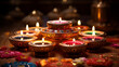 Diwali, Hindu festival of lights celebration. Diya oil lamps against dark background