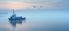 Serene Dawn Over Water With Fishing Boat And Flying Seagulls