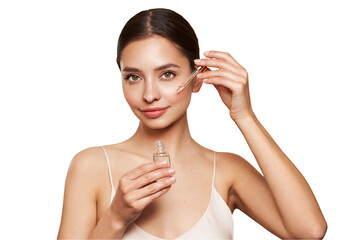 Wall Mural - young beautiful woman applying face serum with pipette. cosmetic procedures for facial skin care