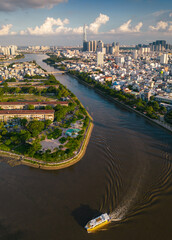 Wall Mural - Panoramic view of Saigon, Vietnam from above at Ho Chi Minh City's central business district. Cityscape and many buildings, local houses, bridges, rivers