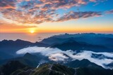 Fototapeta Góry - Aerial view of sunrise over the mountains, foggy and cloudy, clouds, mountain peaks