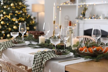 Wall Mural - Christmas table setting with festive decor and dishware in room