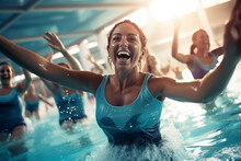 Active beautiful women enjoying aqua fit class in a pool